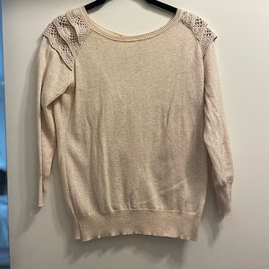Hardly worn cream colored sweater with lace detail
